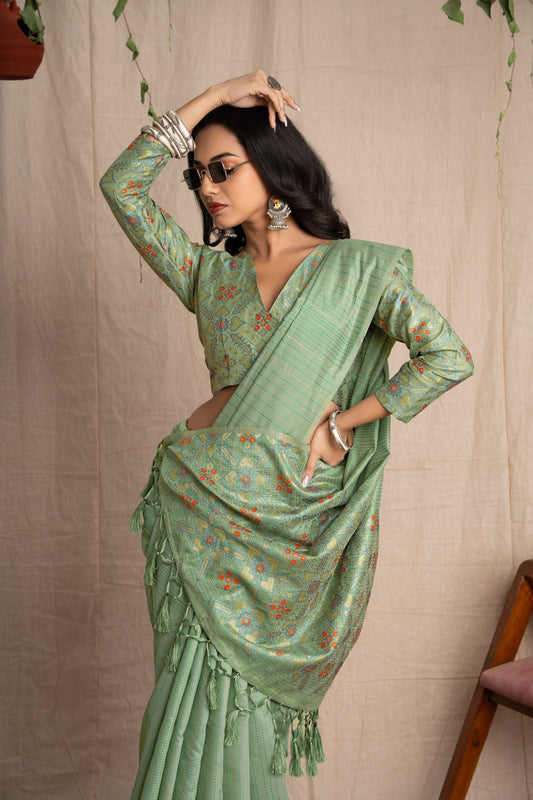 Patrisha | Green Spun Polyester Kantha + Patola Design Jacquard Woven Saree.