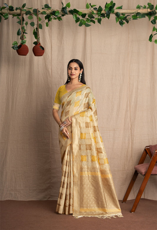 Vritika | Ivory With Yellow Muga Cotton Geometric Woven Saree.