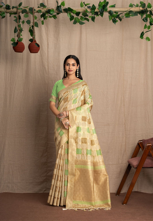 Vritika | Ivory with Green  Muga Cotton Geometric Woven Saree.