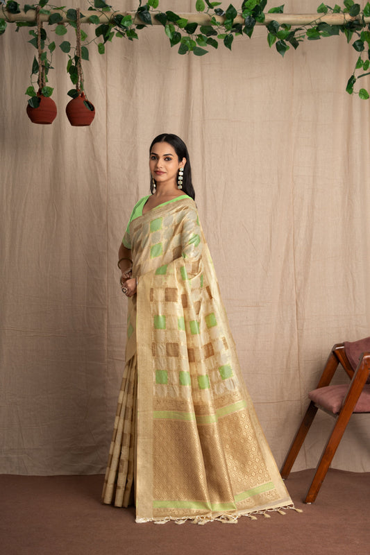 Vritika | Ivory with Green  Muga Cotton Geometric Woven Saree.