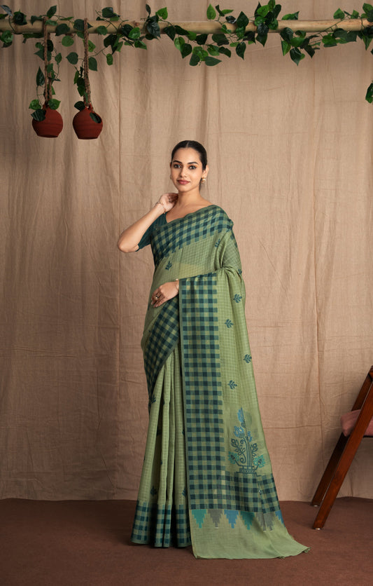 Vasantika | Green Cotton Muga Jamdani Woven Saree.